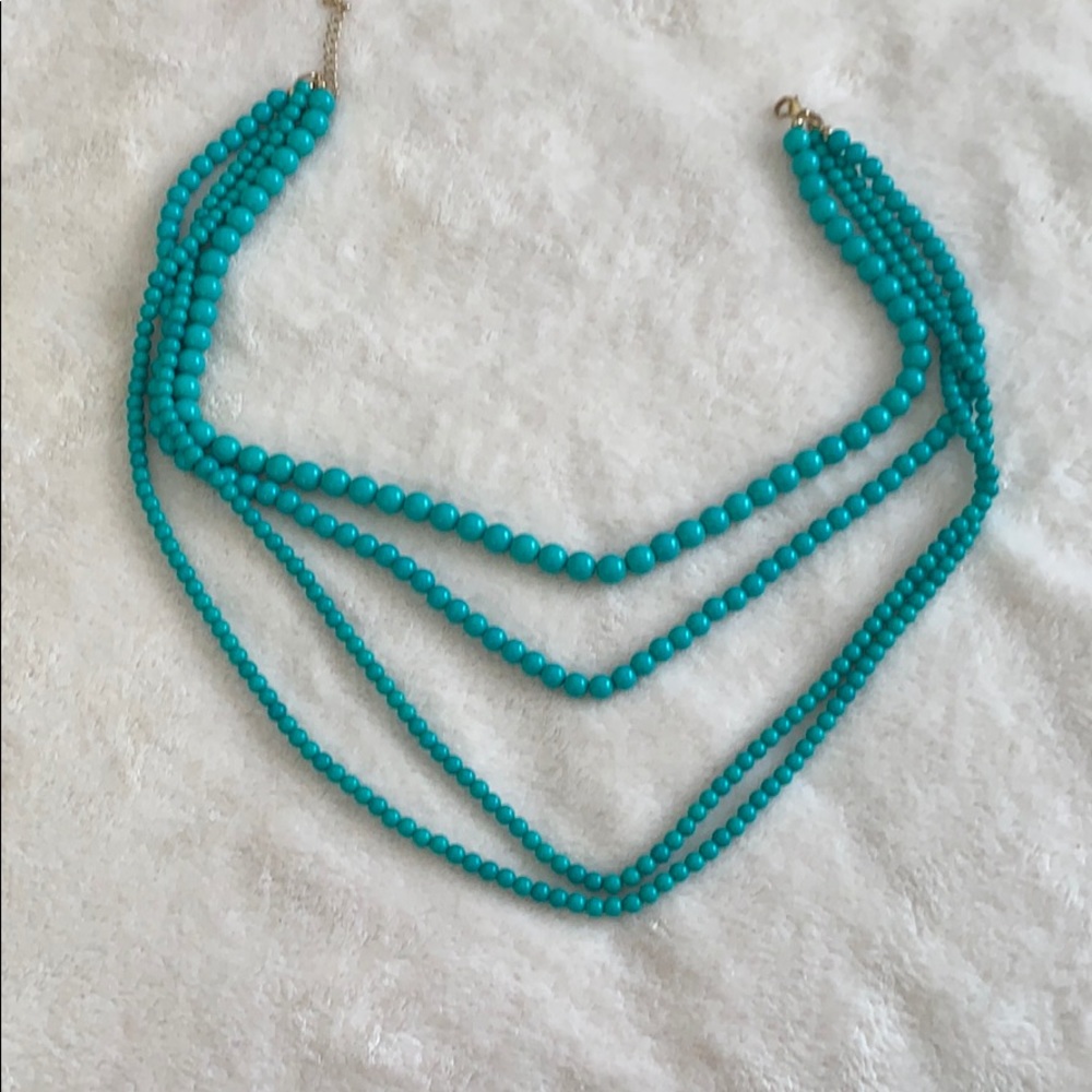 Layered necklace.